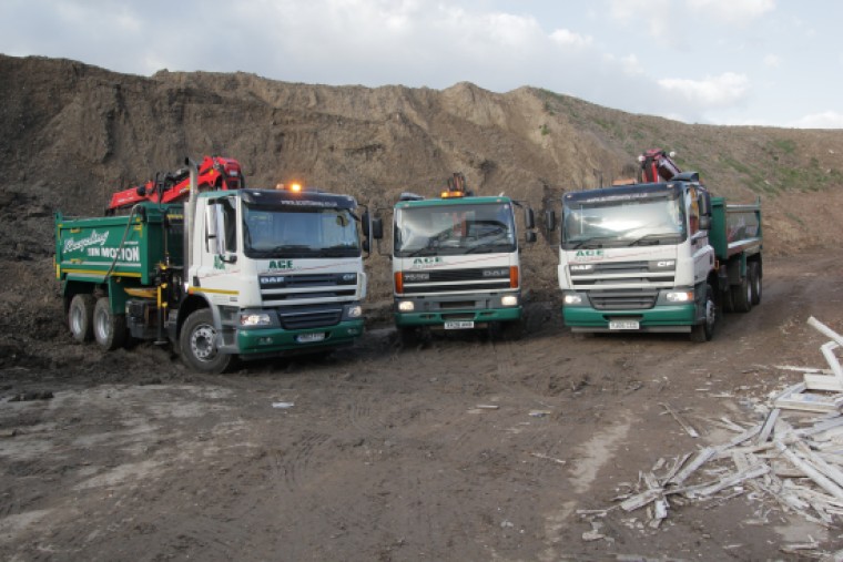 3 Ace lorries in quarry.